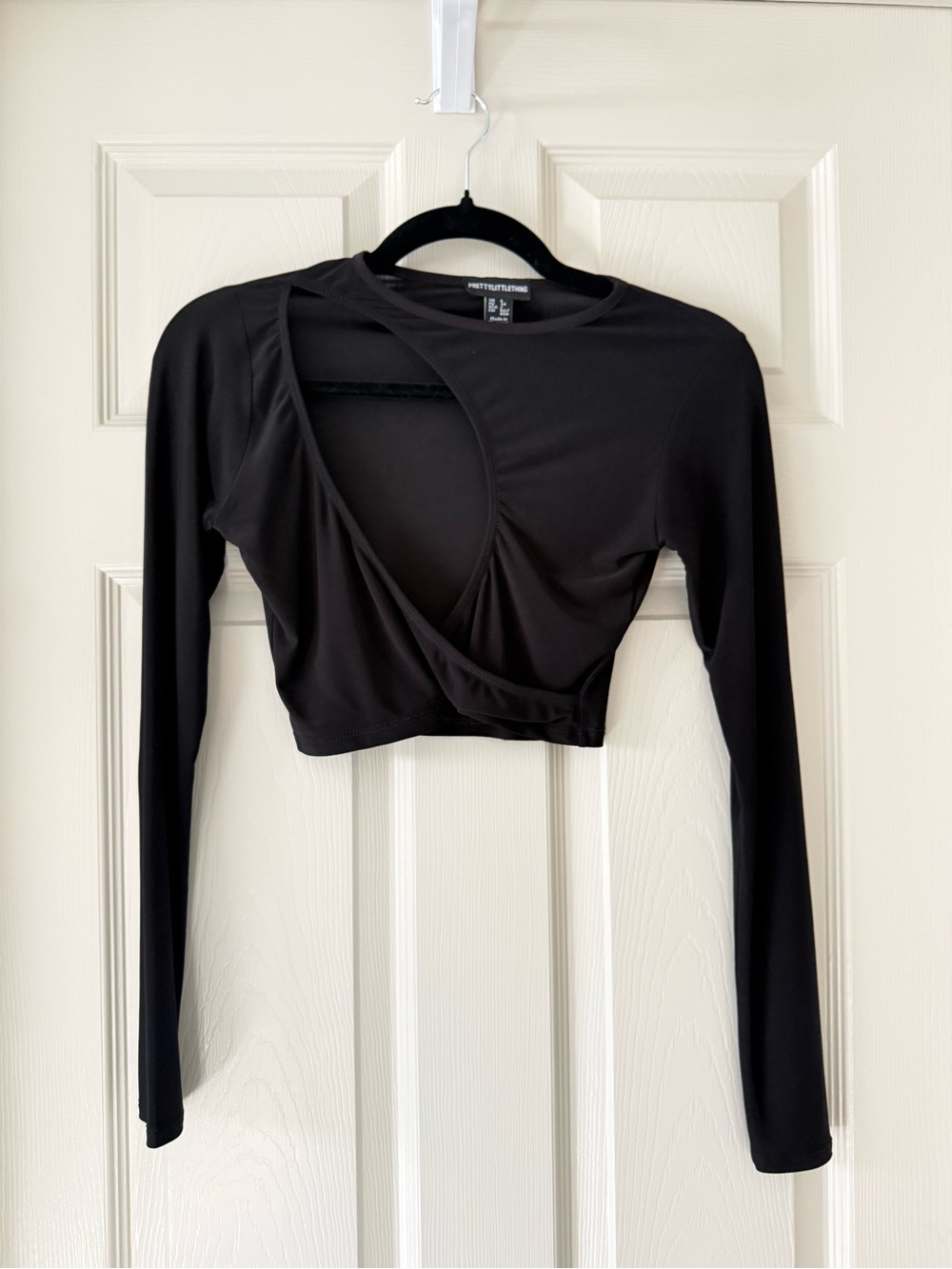 PrettyLittleThing Black Long-Sleeve Crop Top with Asymmetrical Cutout